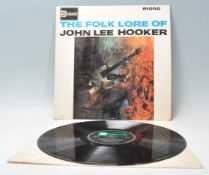 A vinyl long play LP record album by John Lee Hooker – The Folk Lore Of – Original Stateside 1st U.