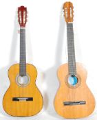 Two vintage six string acoustic guitars to include a Artist Quality Guitar. Together with a BM