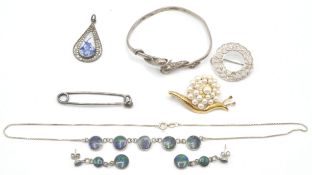 A collection of silver and costume jewellery to include azurmalachite necklace and earring set. A