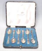 A set of six 1930's Art Deco Walker and Hall silver hallmarked tea spoons having stepped design
