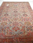 A good large vintage 20th Century floor rug having cream ground with floral and pattern decoration