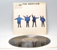 A vinyl long play LP record album by The Beatles – Help – Original Parlophone 1st U.K. Press – PMC