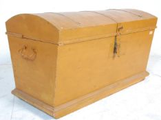 A Victorian 19th century shabby chic painted dome top chest - trunk. . Raised on rails, the tapering