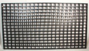 A vintage 20th Century ebonised wooden frame room divider / pierced wall constructed from jointed