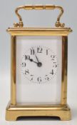 A good quality early 20th century brass cased carriage clock having enamel dial with Roman numeral