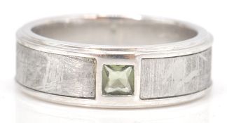 A silver 925 Muonionalusta Meteorite ring complete in presentation box and stamped 925. Weight 9.