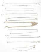 A group of silver necklace chains to include a box link example having a spring ring clasp, three