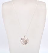 A stamped sterling silver CZ and blister pearl heart shaped pendant necklace on a snake chain held