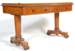 A Regency 19th century burr oak library table - writing table desk having a green leather writing