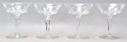A set of four vintage Waterford crystal cut glass champagne / cocktail glasses having wide faceted
