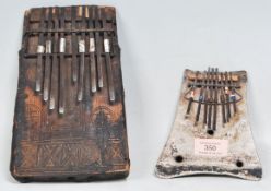 Two African metal Kilimba / Sansa thumb piano' s to include one having a square wooden base with