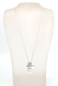 A good Gucci designer silver necklace and chain. The box link chain having a three section silver