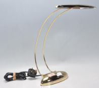 Ross - Model T-121 - A contemporary retro style brass reading lamp having an oval elongated shade