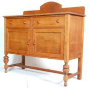 A 20th Century 1930's oak side cupboard / serving sideboard credenza having twin drawers above