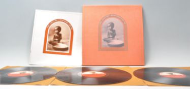 A three vinyl long play LP record album box set by George Harrison – The Concert For Bangladesh –