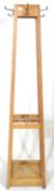 A vintage retro mid century oak framed Industrial office / school coat hook hall stand having four