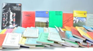 A mixed group of vintage football related handbooks and magazines to include runs for the Western
