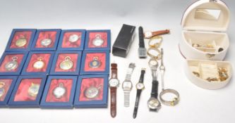 A collection twelve Franklin Mint type pocket watches with many gilt examples, with full hunter