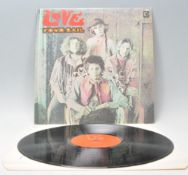 A vinyl long play LP record album by Love – Four Souls – Original Elektra 1st U.K. Press – EKS 74049