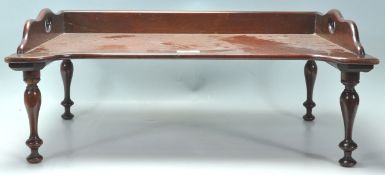 A 19th century Victorian mahogany butlers / breakfast tray with a raised  gallery back and edge with