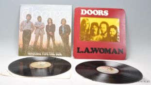 Two vinyl long play LP record albums by The Doors to include – L.A. Woman – Original Elektra 1st U.