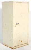 A mid 20th Century Industrial cabinet unit constructed from white metal having a single door with