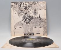 A vinyl long play LP record album by The Beatles – Revolver – Original Parlophone 1st U.K. Press –