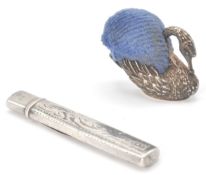 A silver hallmarked pencil casing having engraved