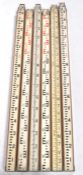A collection of  six 20th century wooden three section extending surveyors measures with metal
