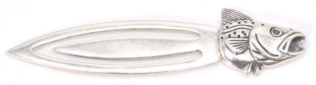 A stamped sterling sliver bookmark terminating in a fishes head finial set with red stone eyes.