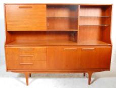 A retro mid 20th Century teak wood sideboard / highboard having a drop down cocktail cabinet to