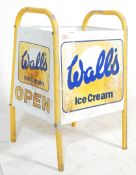 A vintage retro 20th Century Wall's advertising sign / waste bin frame having a yellow painted