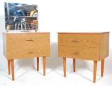 A retro 20th Century melamine teak wood effect dressing table chest of small proportions having a