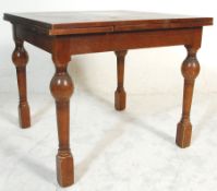 A 1930's Art Deco oak refectory draw leaf dining t