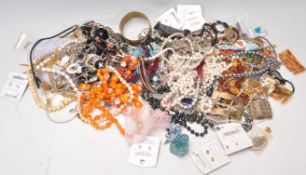 A collection of vintage costumer jewellery to include cultured pearl necklaces, simulated pearl