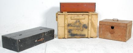 A group of four wooden storage boxes to include a pine square example with a hinged cover, one oak