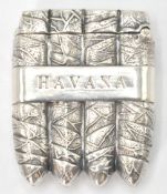 A silver vesta case in the form of four cuban cigars and the word Havana stamped on both sides.