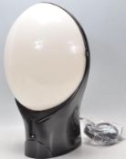 A mid 20th Century Art Deco style wall light converted into a table lamp having an opaline perspex