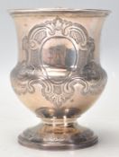 A 19th Century early Victorian silver hallmarked Christening cup having a scrolled design handle,