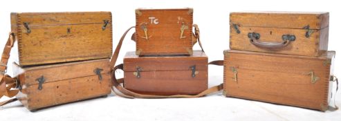 A group of vintage wooden Hilger and Watts and MDS theodolite and equipment boxes, complete with