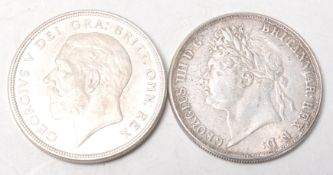 A 19th Century 1822 George III silver crown together with a a 1930 George V crown coin. Both