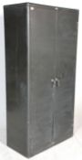 Milner - A large vintage mid 20th Century grey Industrial metal stationary locker cupboard having