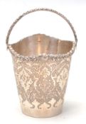 A 20th Century Persian Islamic silver white metal basket having engraved patterned sides with