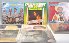 A group of vinyl long LP record albums to include The 