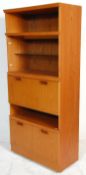 A retro mid 20th Century teak wood room unit having open shelves with a glazed shelf compartment,