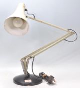 A vintage 20th Century Herbert Terry Anglepoise industrial desk lamp finished in army green enamel