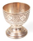 An Islamic silver 84 marked egg cup. The egg cup w