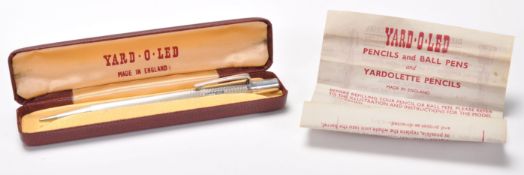 A vintage 1960's silver hallmarked Yardolette propelling pencil having an engine turned body with