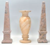 A good pair of antique neoclassical carved marble obelisk mantelpiece ornaments, each being raised