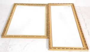 A large 20th century gilt framed rococo rectangular wall mirror with cushion type frame and of